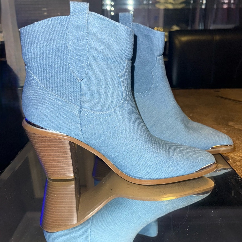 Elegant Western Blue Denim Heeled Boots w/ Silver metal tip toe and heel.